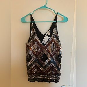 H&M sequin tank. Never worn and with tag. Would be perfect for going out